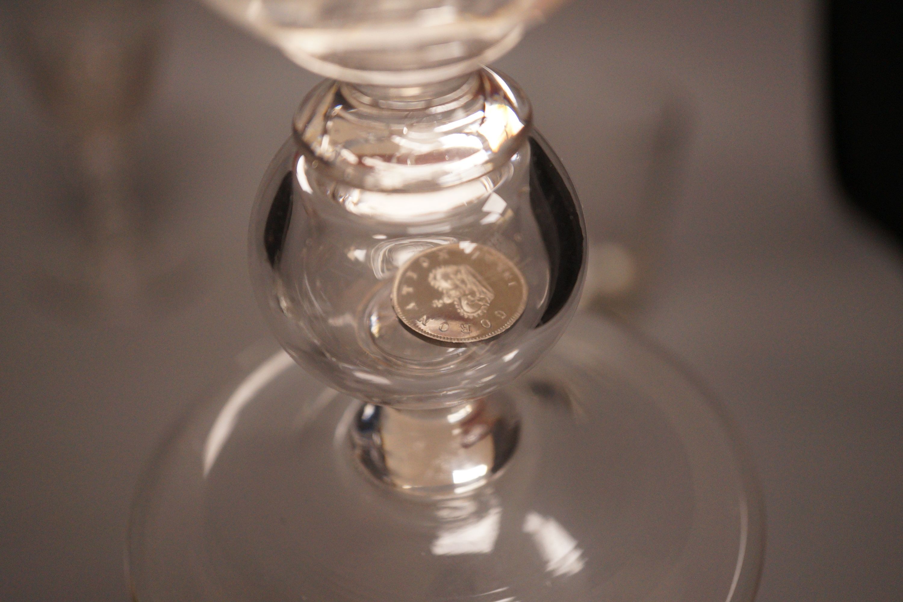 A group of eight 19th/20th century novelty or commemorative glasses, tallest 19.5 cm, including two deceptive glasses, a wheel engraved tumbler with hangman to the base etc.